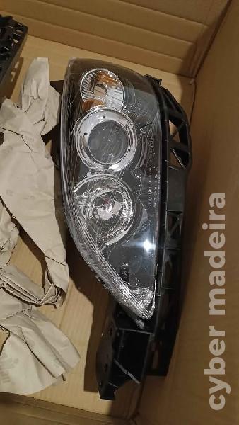 Faróis + Apoios de pára-choques Mazda 3 Bk 2008