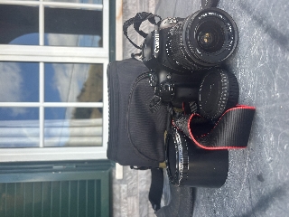 Cânon 1100D 3 Baterias Vem Carregador e Vem Bolsa acessórios